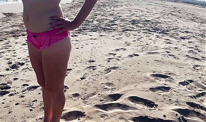 On the public beach, my husband has to keep the chastity cage